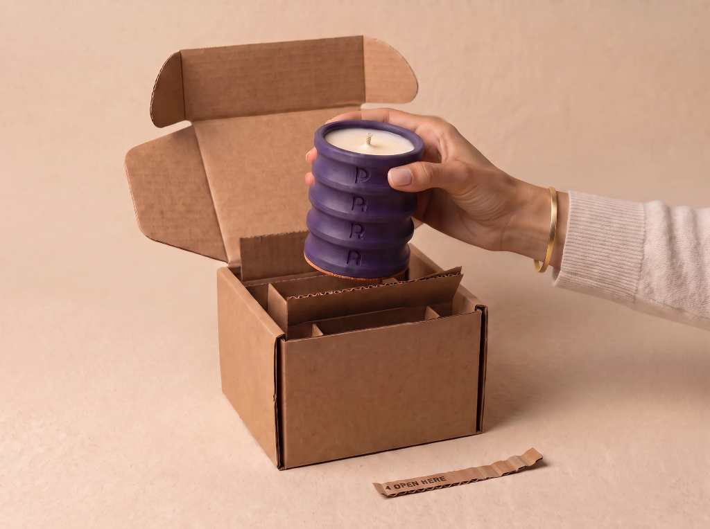 PARA C01 candle lifted from its kraft carton